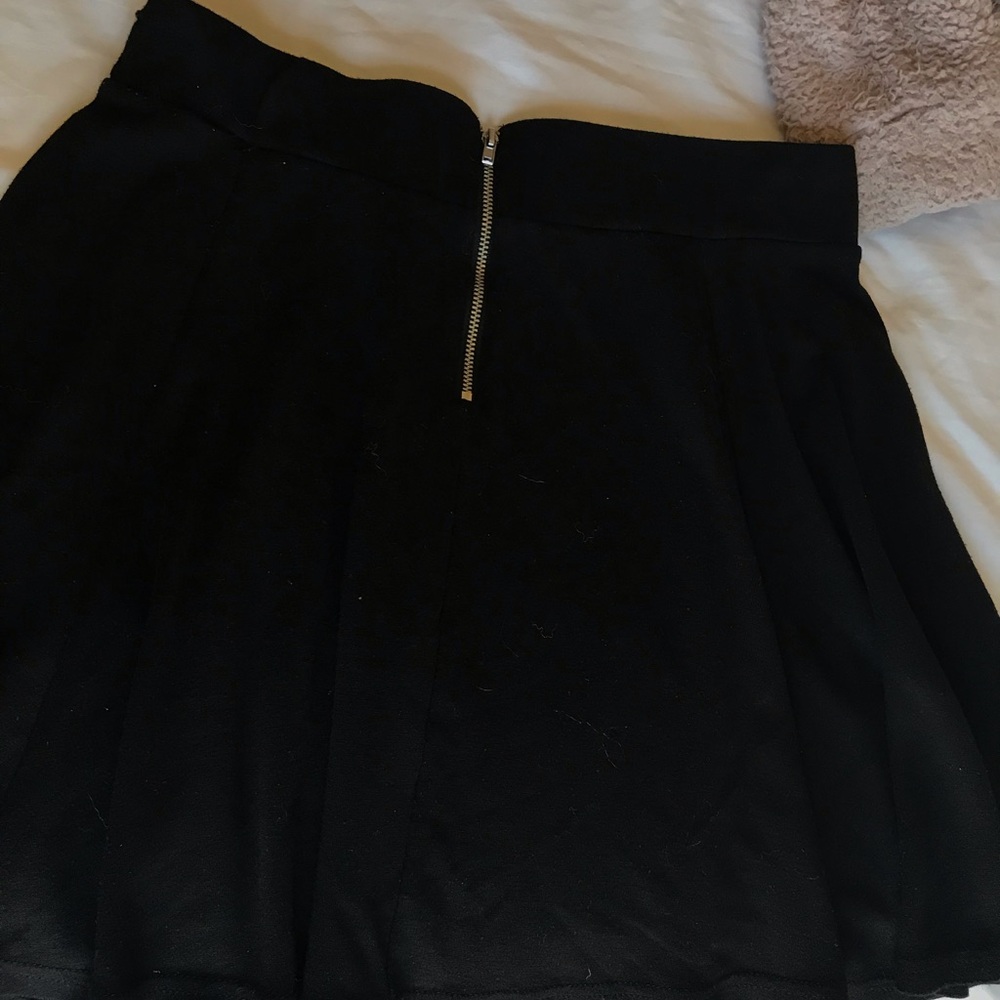 Black mini skirt
